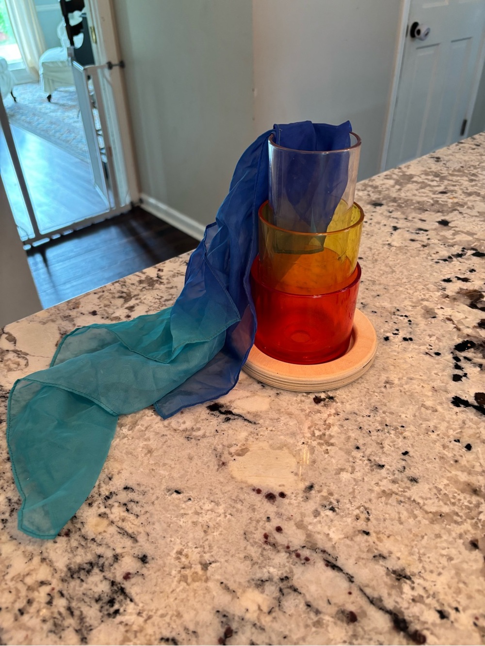 Lovevery transparent tube tower with play scarf from explorer play kit